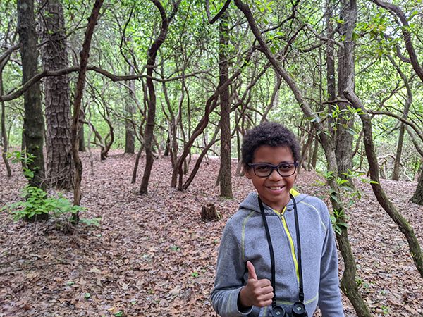 Trailblazer Salim H in the woods