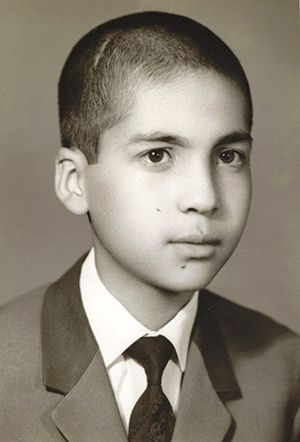 11-year-old Iranian boy with very short haircut (Farzin Amzajerdian)