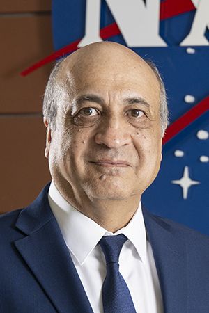 NASA Engineer Farzin Amzajerdian (light-skinned, balding man with NASA logo behind him)